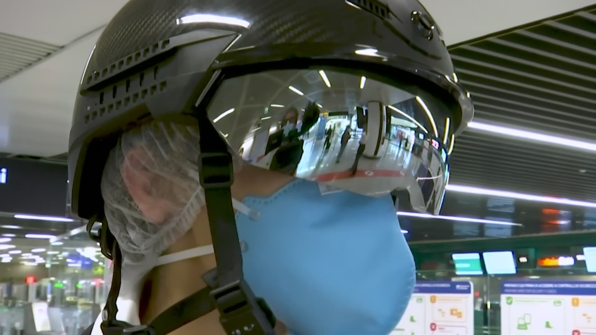 This helmet being tested at Rome's airport can scan a person's temperature from more than 20 feet away.
