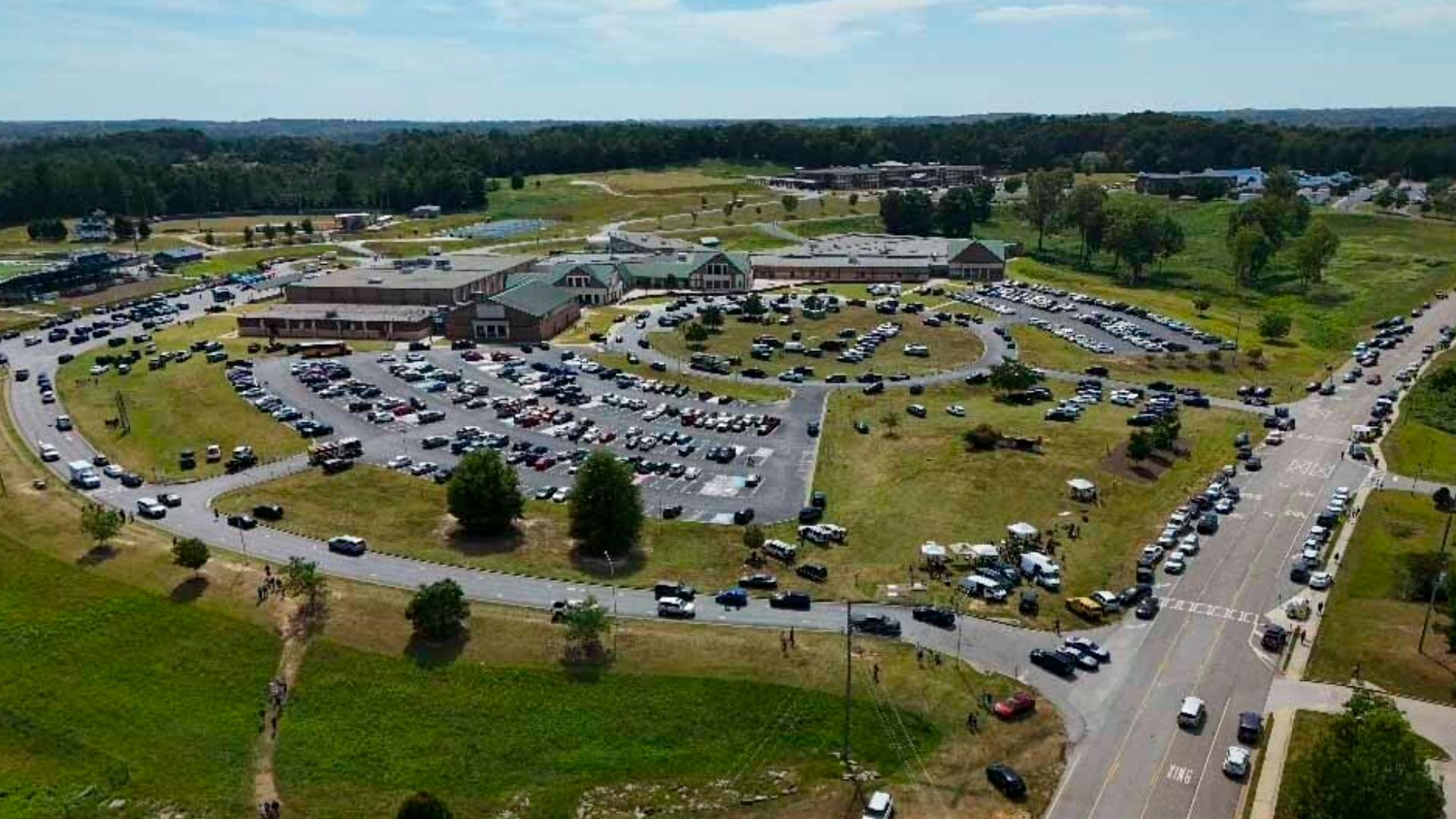 Two students and two teachers were killed in the shooting, officials said.