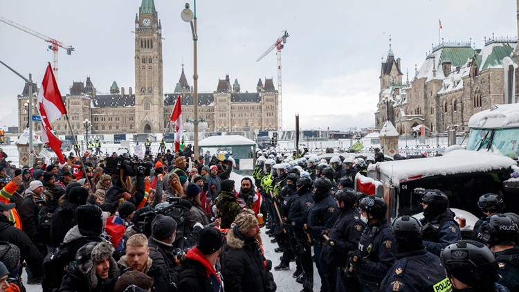 Canada police clear Parliament street in bid to end siege Canada police clear Parliament street in bid to end siege
