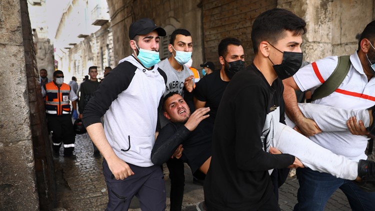Medics say at least 80 Palestinians hospitalized in Jerusalem clashes