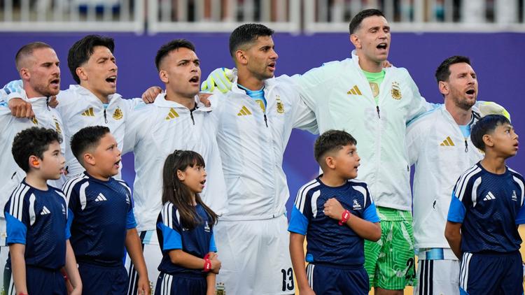 Why do soccer players walk out with kids?