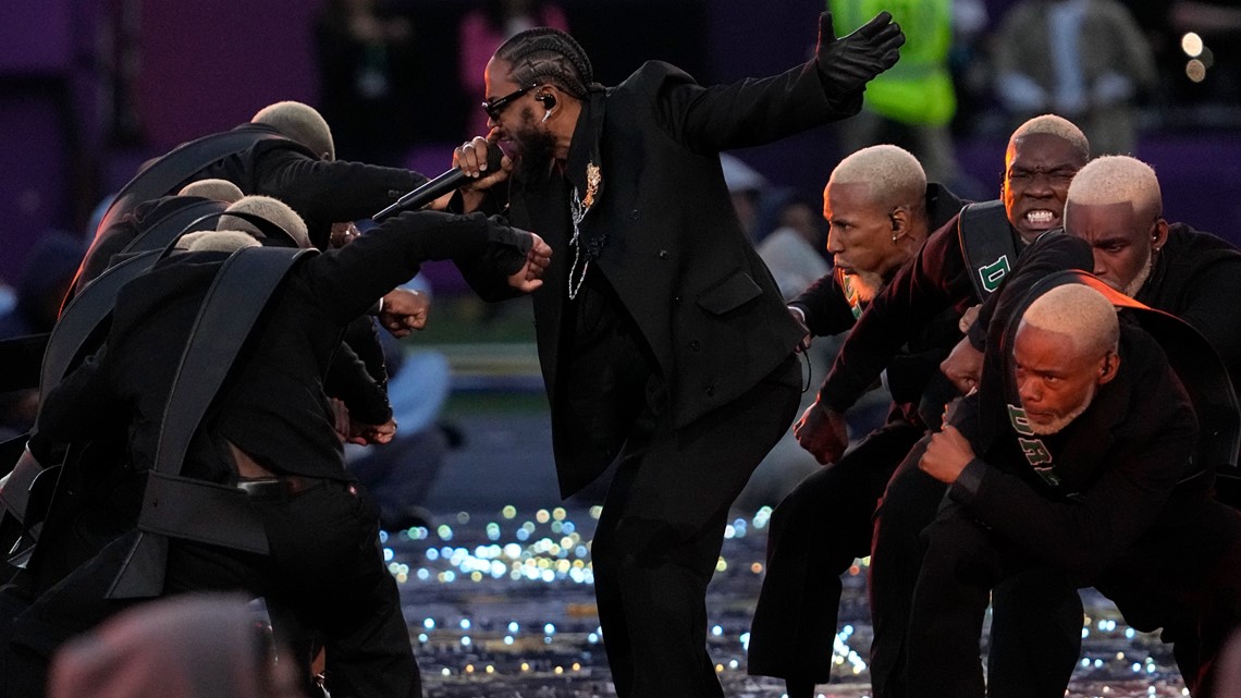 Eminem takes a knee during epic Super Bowl halftime show starring Dre,  Snoop and friends