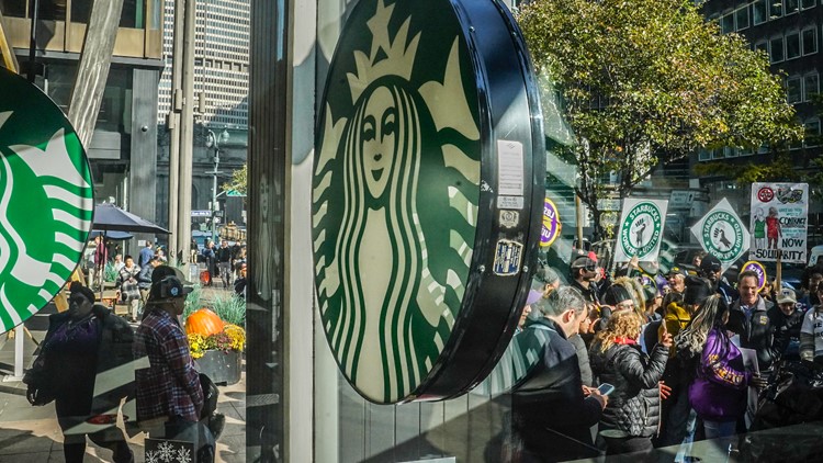Thousands of Starbucks workers strike on one of the busiest days of the year