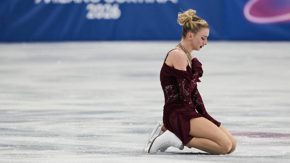 Amber Glenn of the U.S. competes during the short program figure skating at the 2026 Winter Olympics, in Milan, Italy. (AP Photo/Francisco Seco)