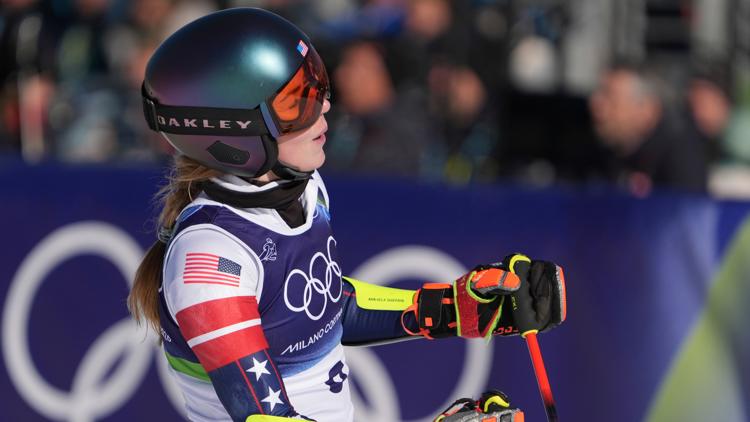 United States' Mikaela Shiffrin at the finish area of an alpine ski, women's giant slalom race, at the 2026 Winter Olympics, in Cortina d'Ampezzo.