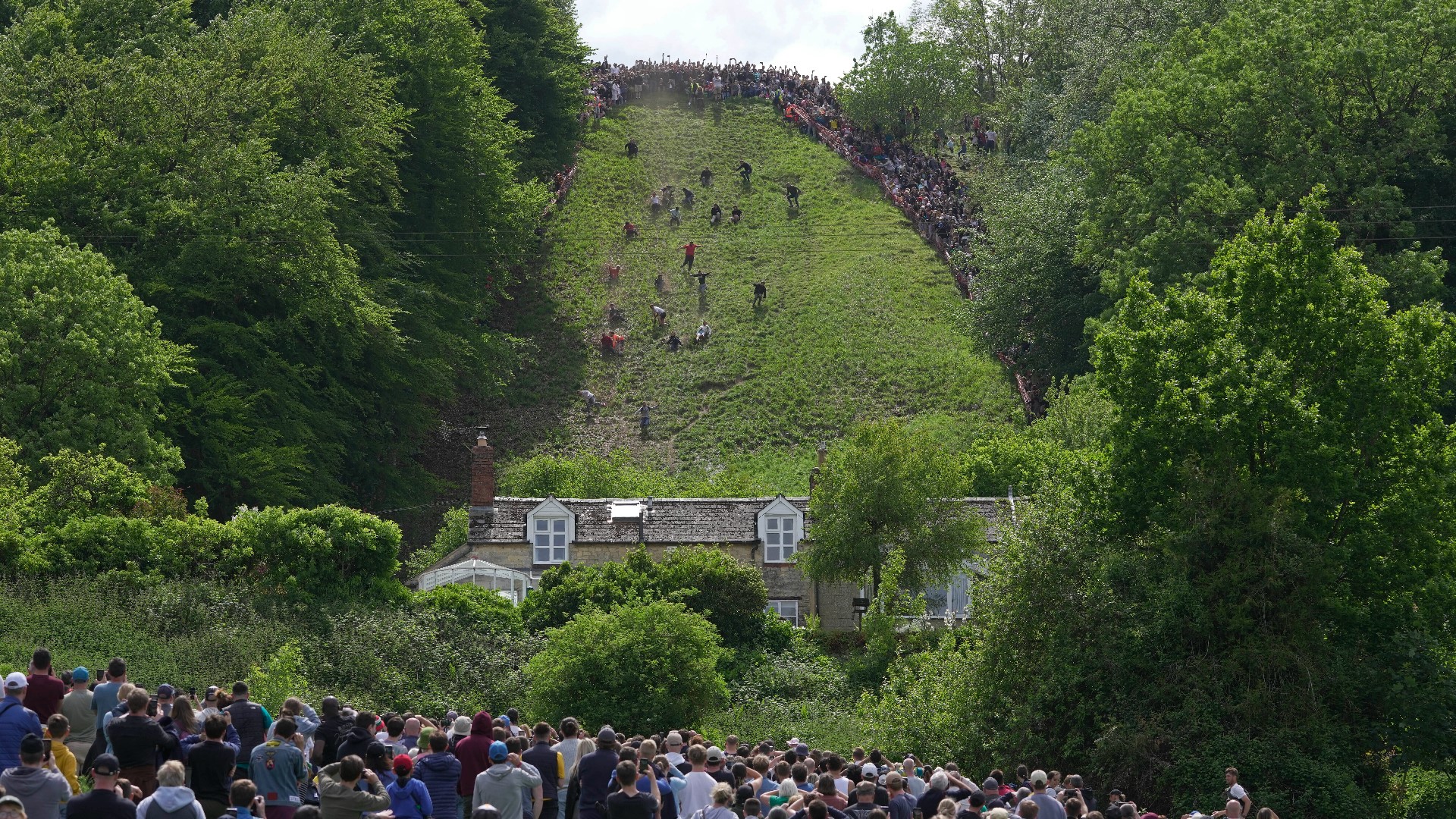 American man wins chaotic UK race chasing cheese down a hill | wthr.com