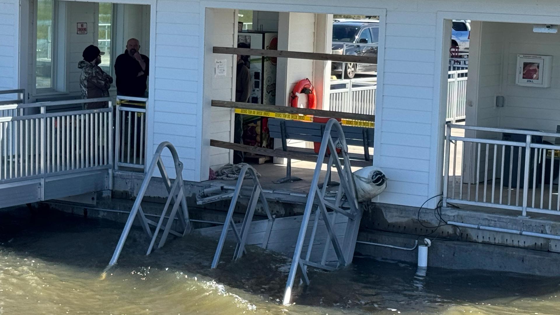 Up to 40 people were standing on the walkway when it collapsed. At least 20 plunged into the water, where a strong tidal current threatened to pull them out to sea.