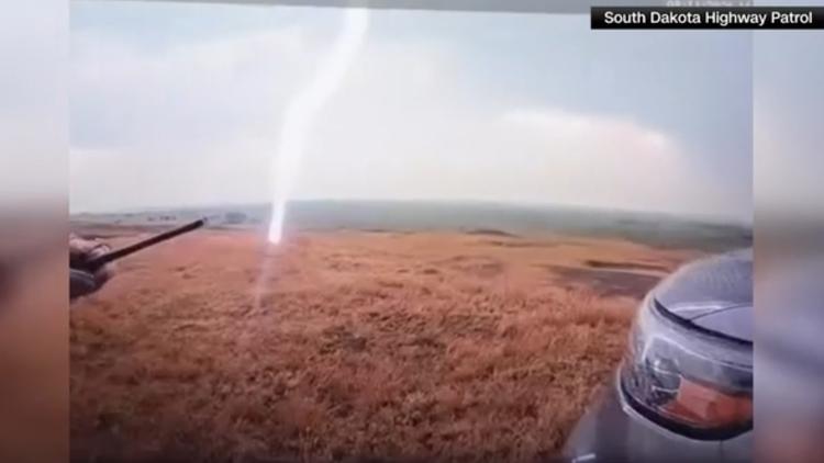 WATCH: South Dakota troopers nearly struck by lightning while on manhunt