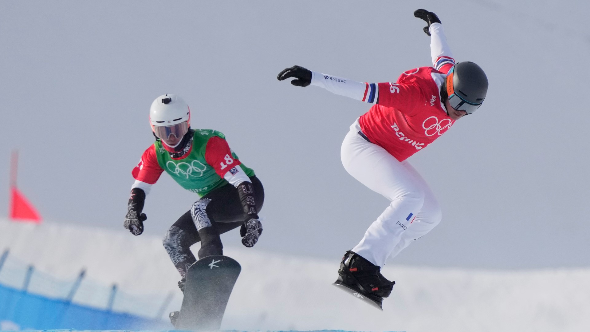 Get ready for a wild ride. Men and women team up on the snowboardcross course for the first time ever at the Winter Olympics Friday.
