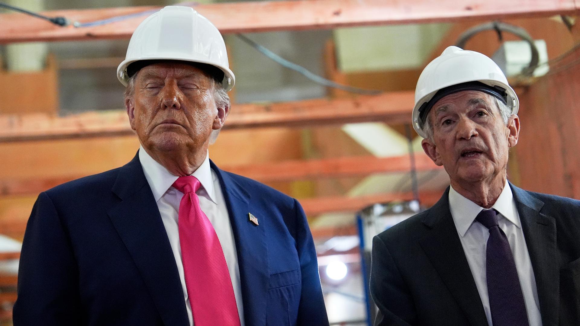 U.S. President Donald Trump and Federal Reserve Chairman Jerome Powell speak to reporters while on tour of renovated building