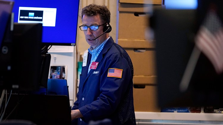 Stocks skid as investors fear virus surge will dent recovery