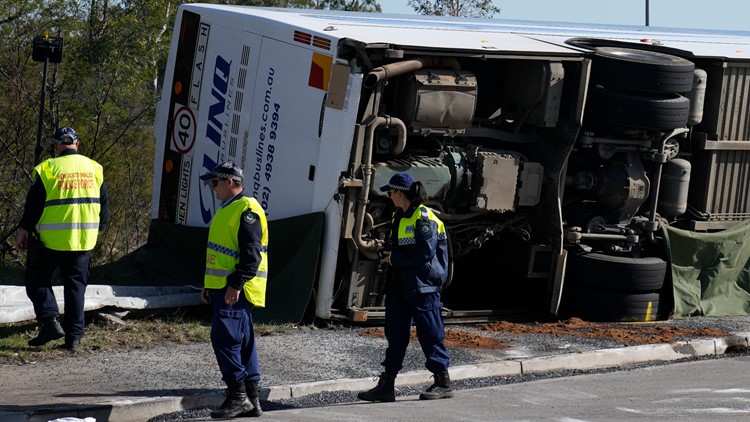 Driver charged after bus carrying wedding guests in Australia rolls over, killing 10 and injuring 25