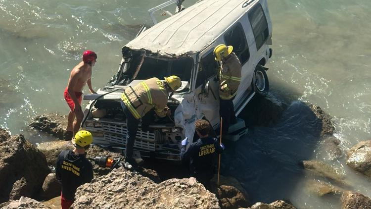 WATCH: Firefighters rescue dog trapped in car after crash in California