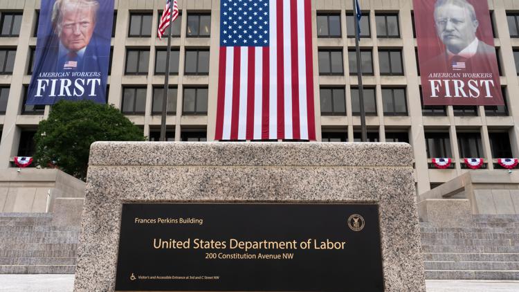 US unemployment claims dip to 206,000 as layoffs continue to remain rare