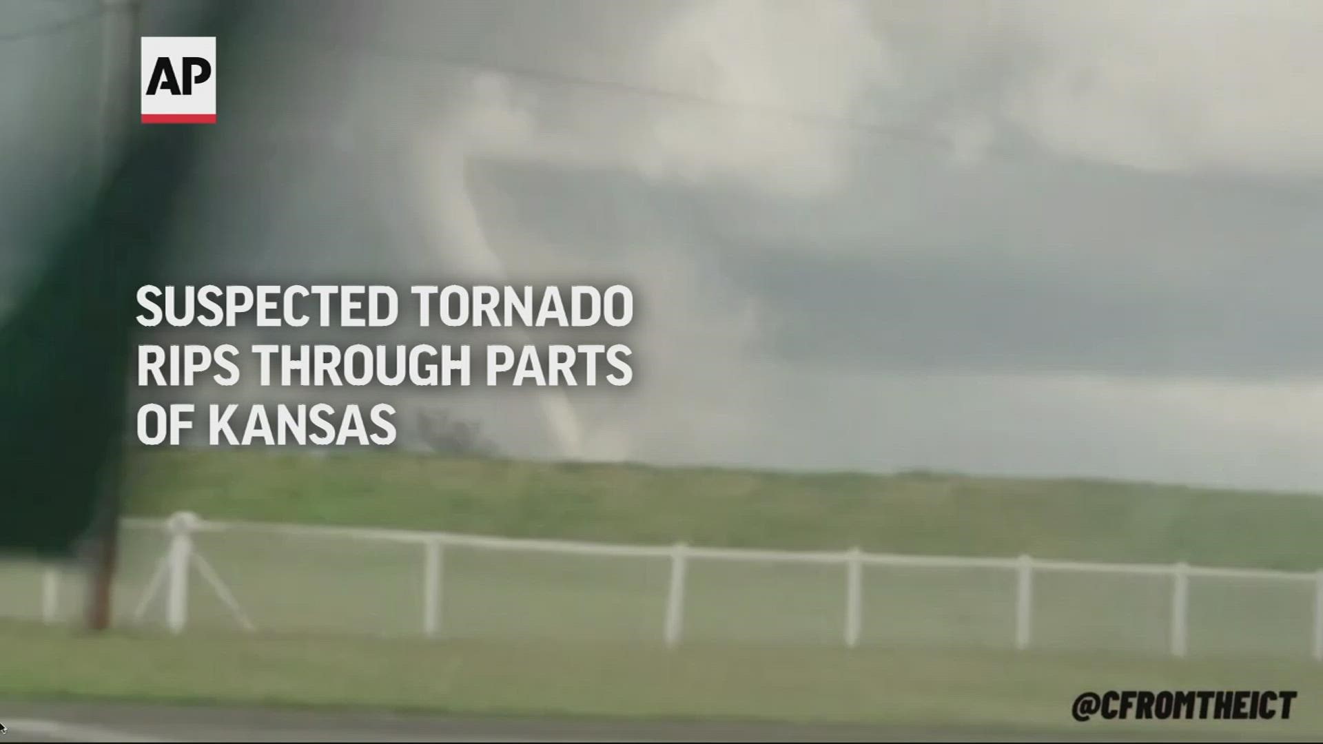 A suspected tornado that barreled through parts of Kansas damaged multiple buildings, injured several people and left more than 6,500 people without power.