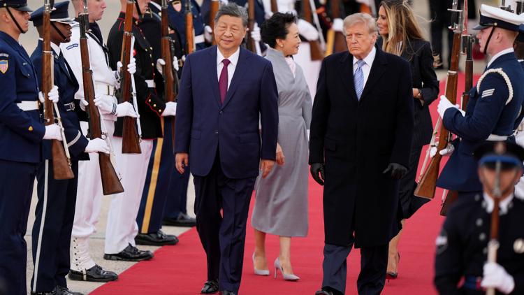China's Xi arrives in Washington, kicking off his state visit with rare planeside welcome from Trump