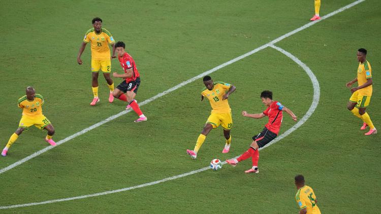 Why are so many players wearing pink cleats at the World Cup?