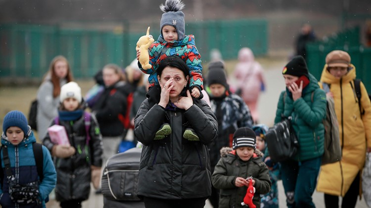 Evacuations halted in Ukraine area where cease-fire pledged