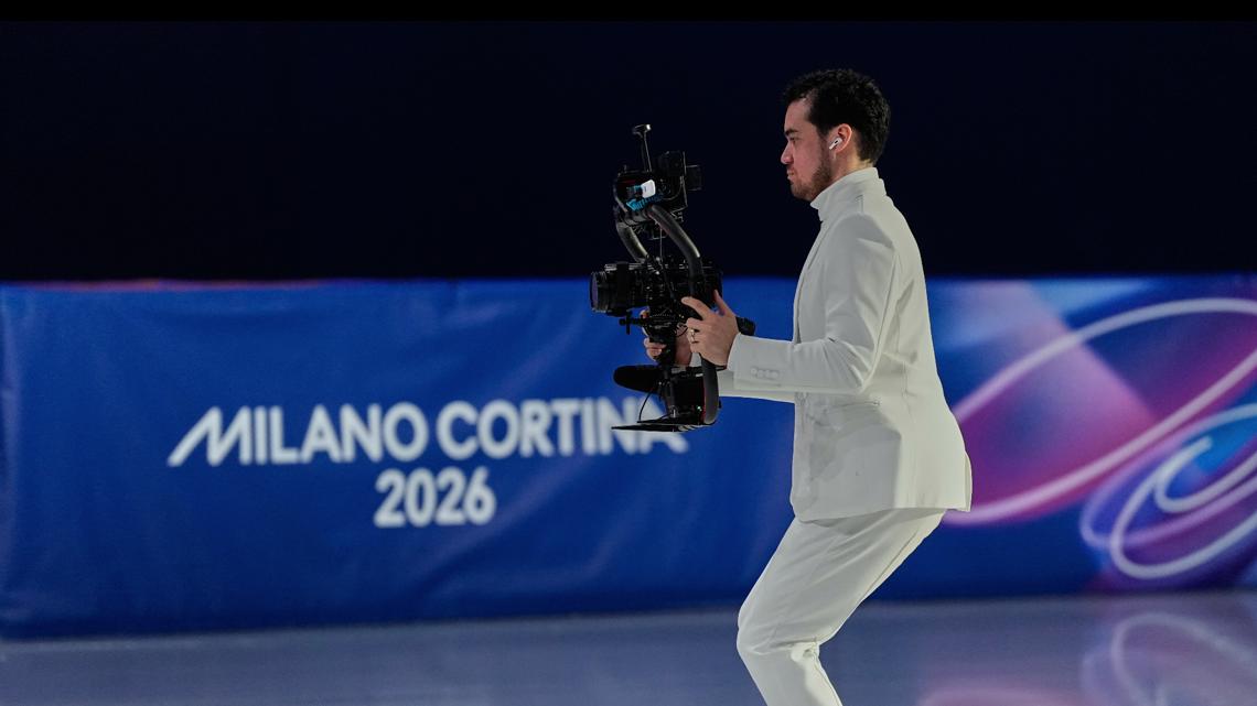 Jordan Cowan operates the steadicam before the pairs figure skating short program at the 2026 Winter Olympics, in Milan, Italy, Feb. 15, 2026.
