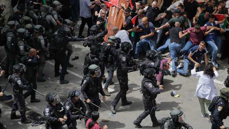 Israel police to investigate conduct at journalist funeral