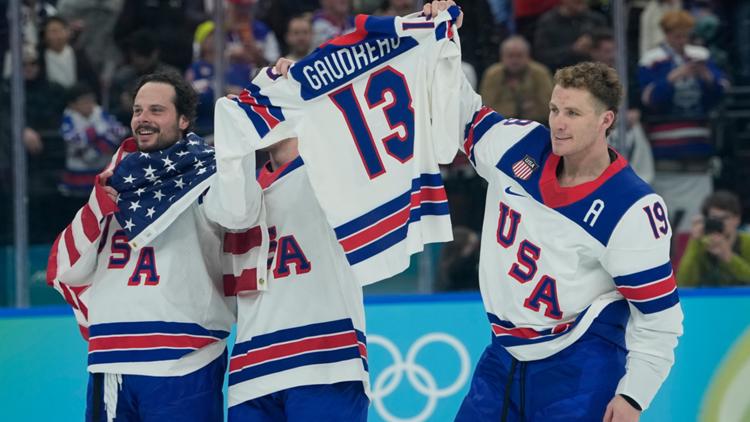 Matthew Tkachuk (19) celebrates after the U.S. defeats Canada in a men's ice hockey gold medal game at the 2026 Olympics, in Italy, Feb. 22, 2026.