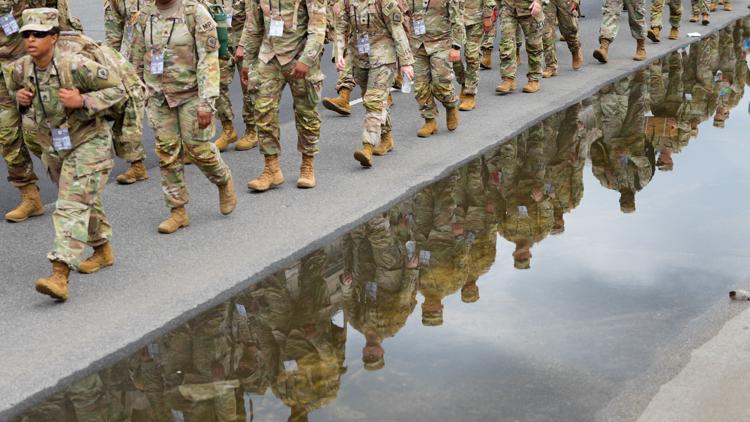 Military parade set to kick off in nation's capital as protesters around the country decry Trump