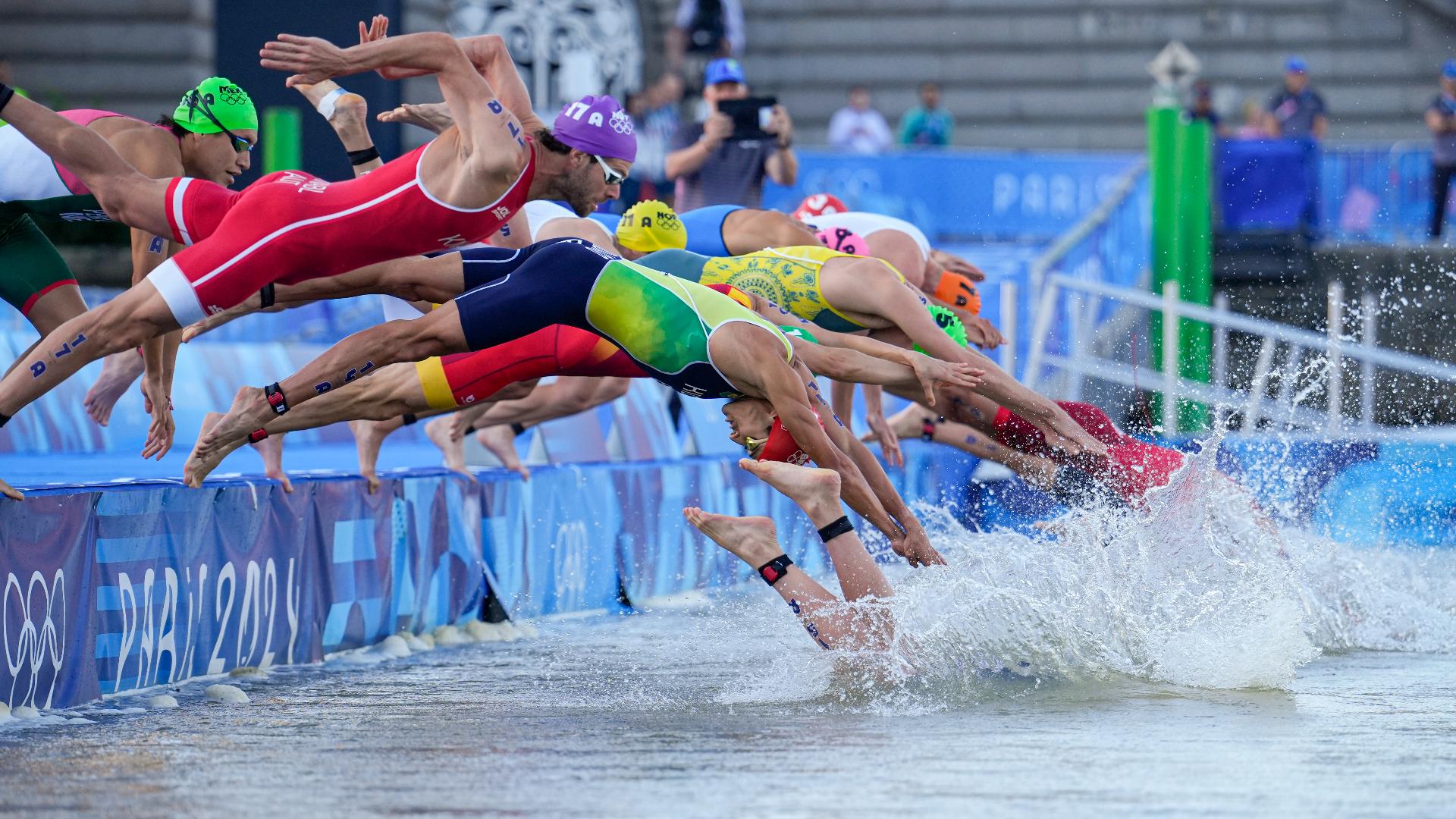 Olympic triathlon mixed relay gets underway with swim in Seine