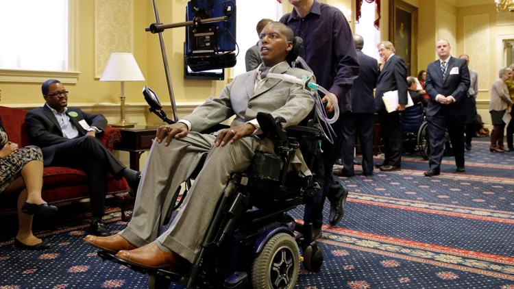 O.J. Brigance, who won a Super Bowl with the Baltimore Ravens before battling ALS, dies at age 56