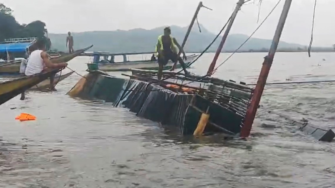 At least 26 dead after boat overturns in Philippines