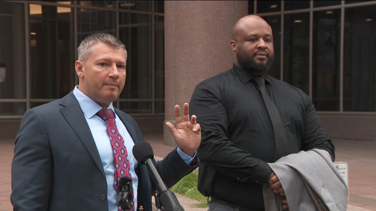 ICE agent charged with pointing a gun at commuters requests case move to federal court