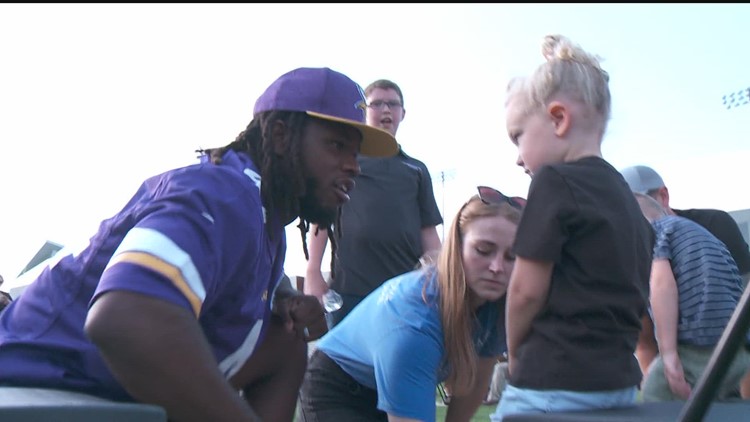 Vikings help foster children return to school