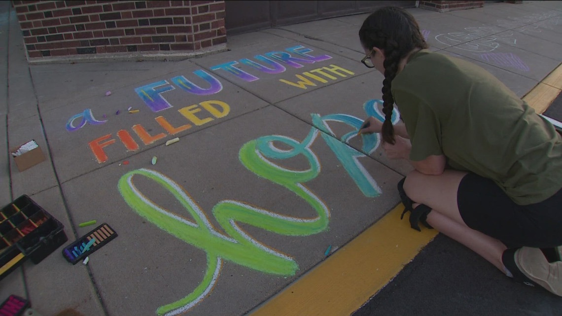 Chalk art adorns Annunciation Catholic School for students' return