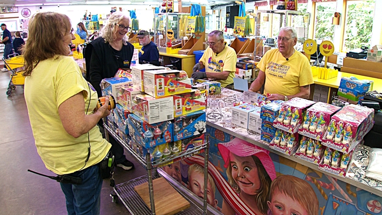 Two men, two scanners and hundreds of thousands of stickers: How Minnesota's biggest candy shop stays old school