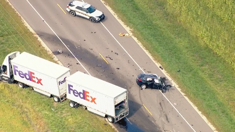 At least 1 dead after crash involving FedEx semi-truck