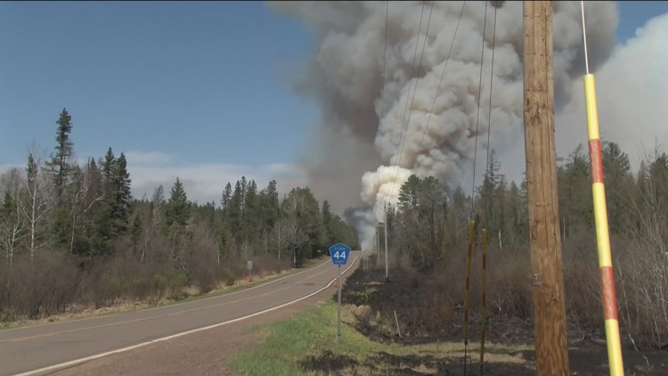 Wildfire expansion slows while more help arrives in northeastern Minnesota