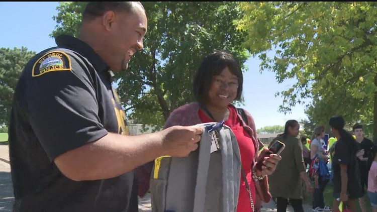 Black police officers help local families get ready for school