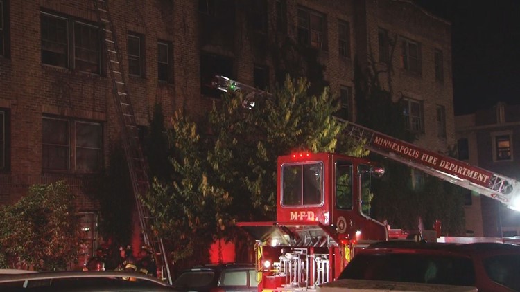 Boarded-up Minneapolis apartment burns, squatters seen running from scene