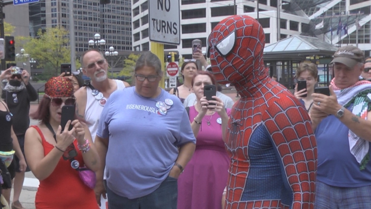 Protester dressed as Spider-Man argues self-defense after being charged with assault during Jake Lang protest