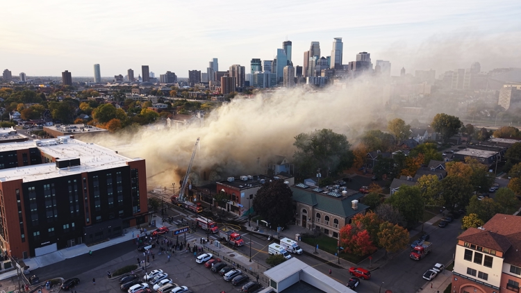 2 firefighters hospitalized with minor burns after commercial building fire in Minneapolis