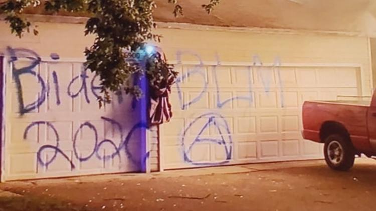 Brooklyn Center man who staged arson with 'Biden 2020' graffiti pleads guilty to hoax