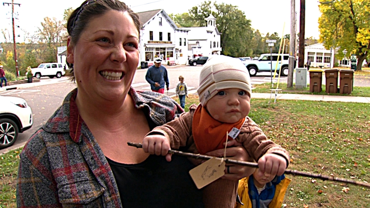 Kid-led 'straightest stick' contest brings scores of entries & smiles to Minnesota village
