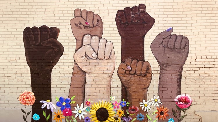 Mural promoting diversity prompts legal threat from small Minnesota town