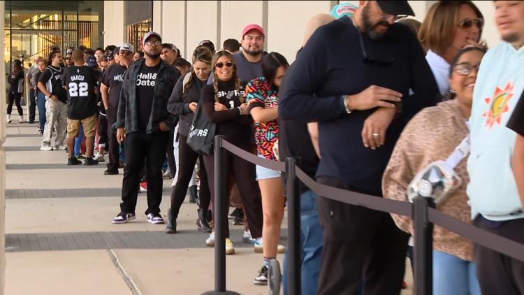 Spurs fans line up to grab a new Fiesta edition jersey at The Rock. Are they still available?