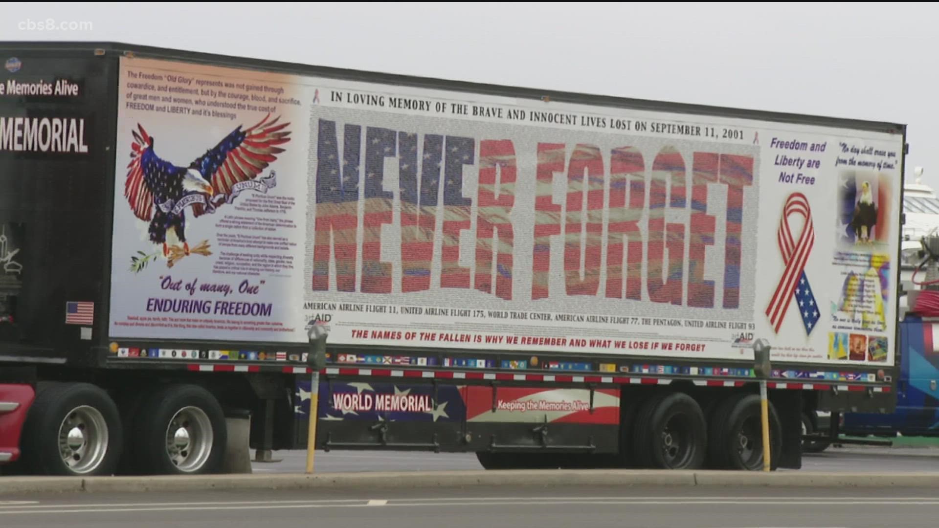 All of the names of the fallen are emblazed on two murals on the sides of the semitrailer.