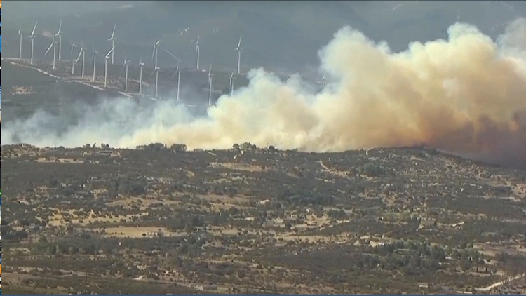 Fire crews battle brush fire in Southeastern San Diego County