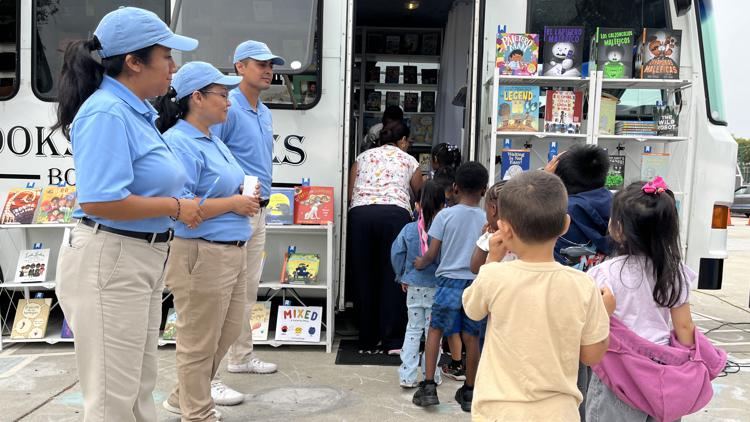 Childhood school revisited: Bookmobile owner donates 500 books for Hispanic Heritage Month