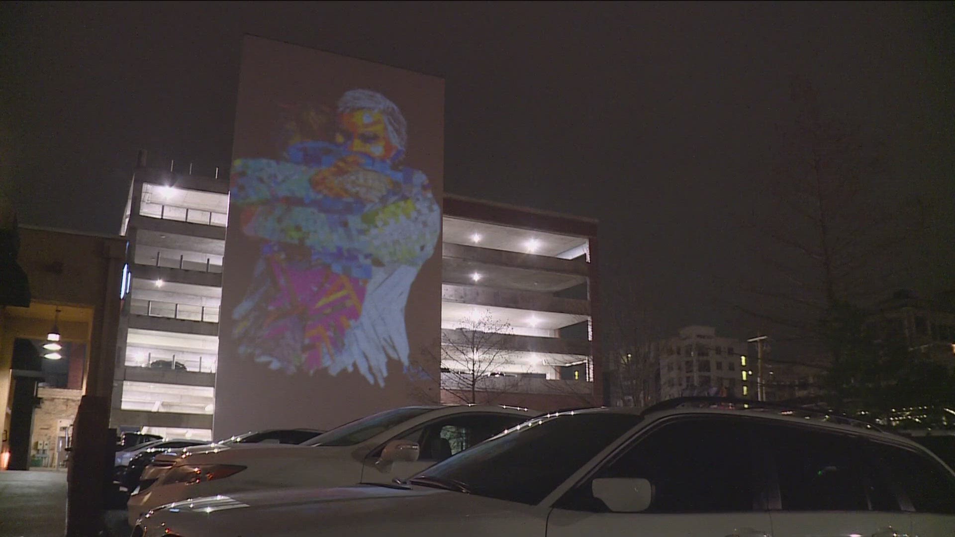 THE WEST AVENUE PARKING DECK OFF DICKSON STREET....NOW HAS A DIGITAL ART INSTALLATION FOR EVERYONE TO ENJOY.