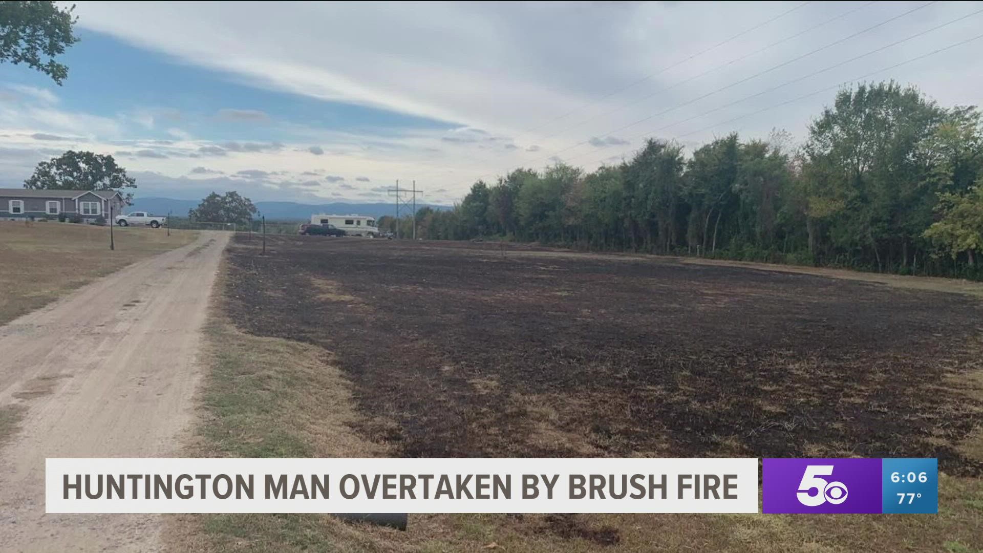 A woman says her husband died while fighting a brush fire at their rural River Valley home.