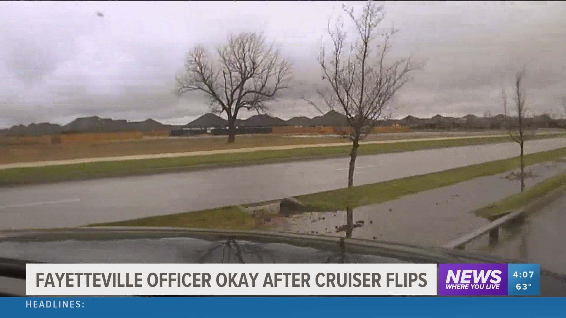 Fayetteville Police Officer okay after cruiser flips