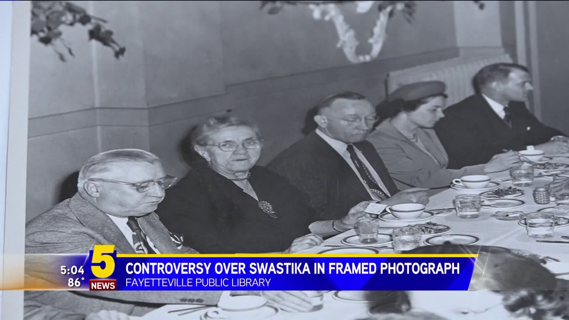 Controversy Over Swatika In Framed Photograph